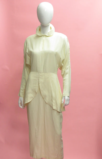 1990’s Archive Norma Kamali Dolman sleeve peplum Dress